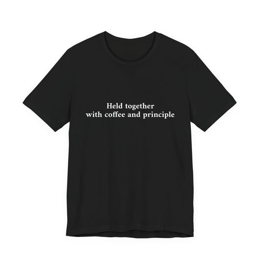 Black t-shirt with 'Held together with coffee and principle' text on a white background